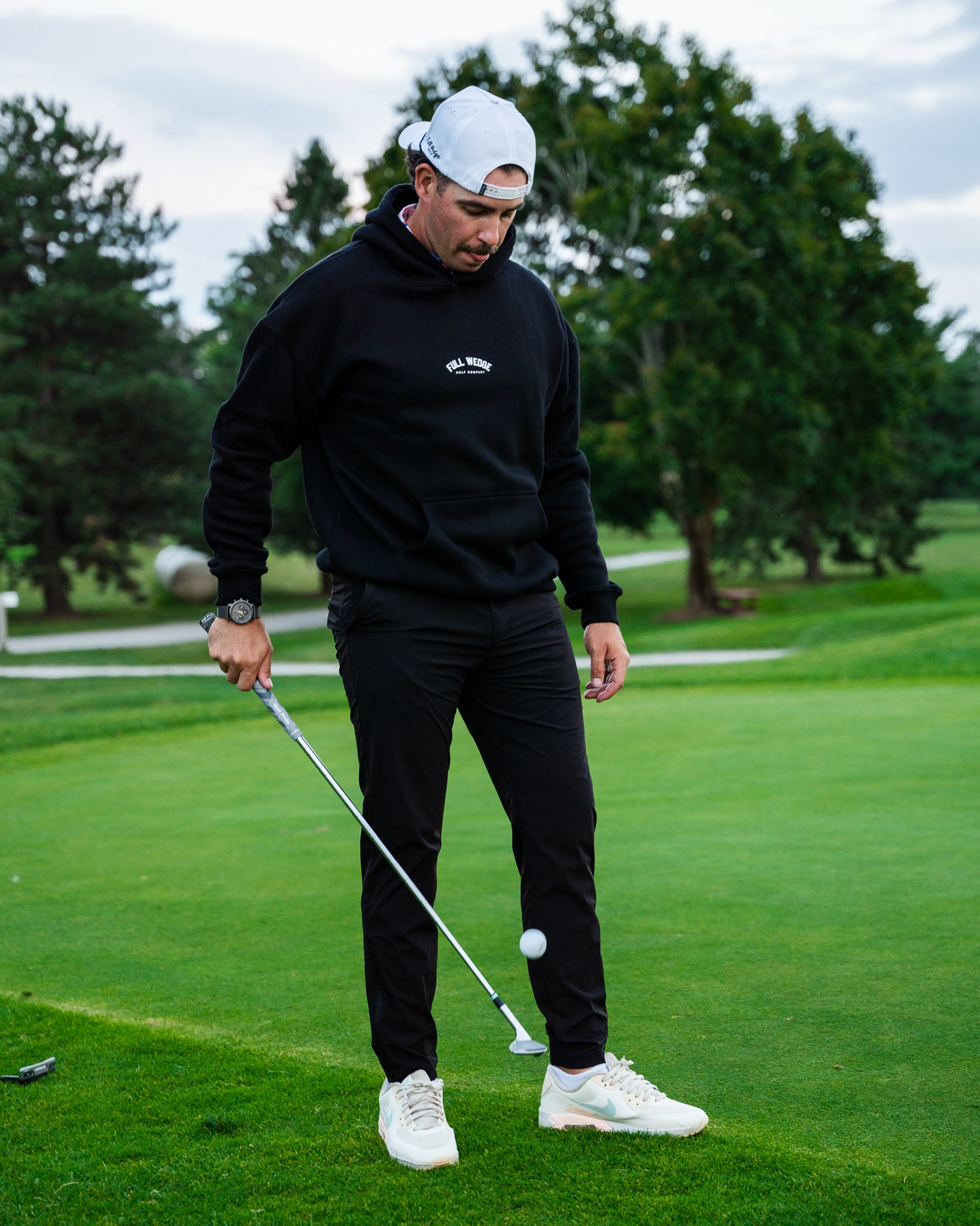 Golfer wearing online hoodie